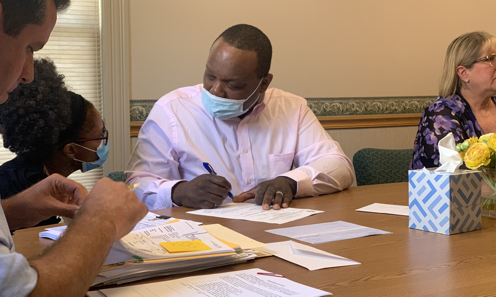 Allen signing his first commercial real estate deal